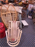 Pair of snowshoes and child's pull-behind