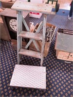 Small wooden two-step ladder and small
