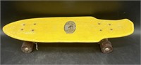 1970s Makaha Wedge Yellow Skateboard