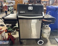 Nice Weber Gas Grill & Propane Tank.