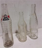 Three Soda Bottles Including Evangeline