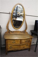 Three drawer dressing stand with swivel mirror,