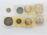 8 Individually packaged silver coins of the world: