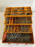 Tackle box full of screws and bolts.