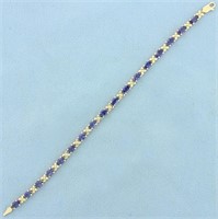8.5ct TW Tanzanite Flower Design Line Bracelet in