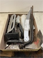 Entire box of assorted trowels, saw blade, hole