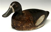 A CARVED AND PAINTED BLUEBILL HEN WORKING DECOY