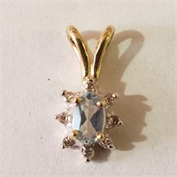 $800 14K  Dai(0.06ct) Blue Topaz(0.25ct) Pendant