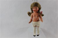 Celluloid Doll with Turtle Markings on Back