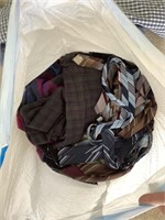 Garbage bag full of men’s dress shirts and ties,
