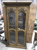 Mediterranean style Fruitwood two door lighted