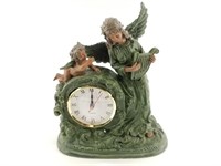 Angel and cherub mantle clock about 8" wide