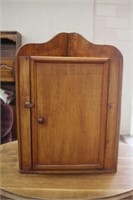 Corner cabinet with two interior shelves,