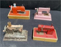 Group of vintage toy sewing machines untested