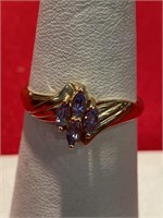 Topaz ring with four stones. Size 7 3/4. 10 K.