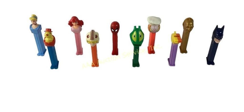 Pez dispensers. Garfield,star war pilot, Ariel,