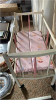Antique pink baby crib. 26 x 13 x 20 inches