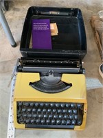 brother small vintage portable typewriter yellow