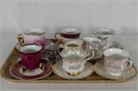 6 Tea Cups And Saucers, 2 Creamers