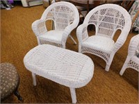 2 wicker chairs and oval coffee table