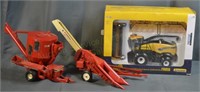 New Holland Harvester in Box & Case IH Machinery