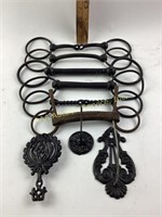 Cast iron horse bridles.  Cast iron bill/memo