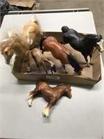 BOX OF TOY HORSES