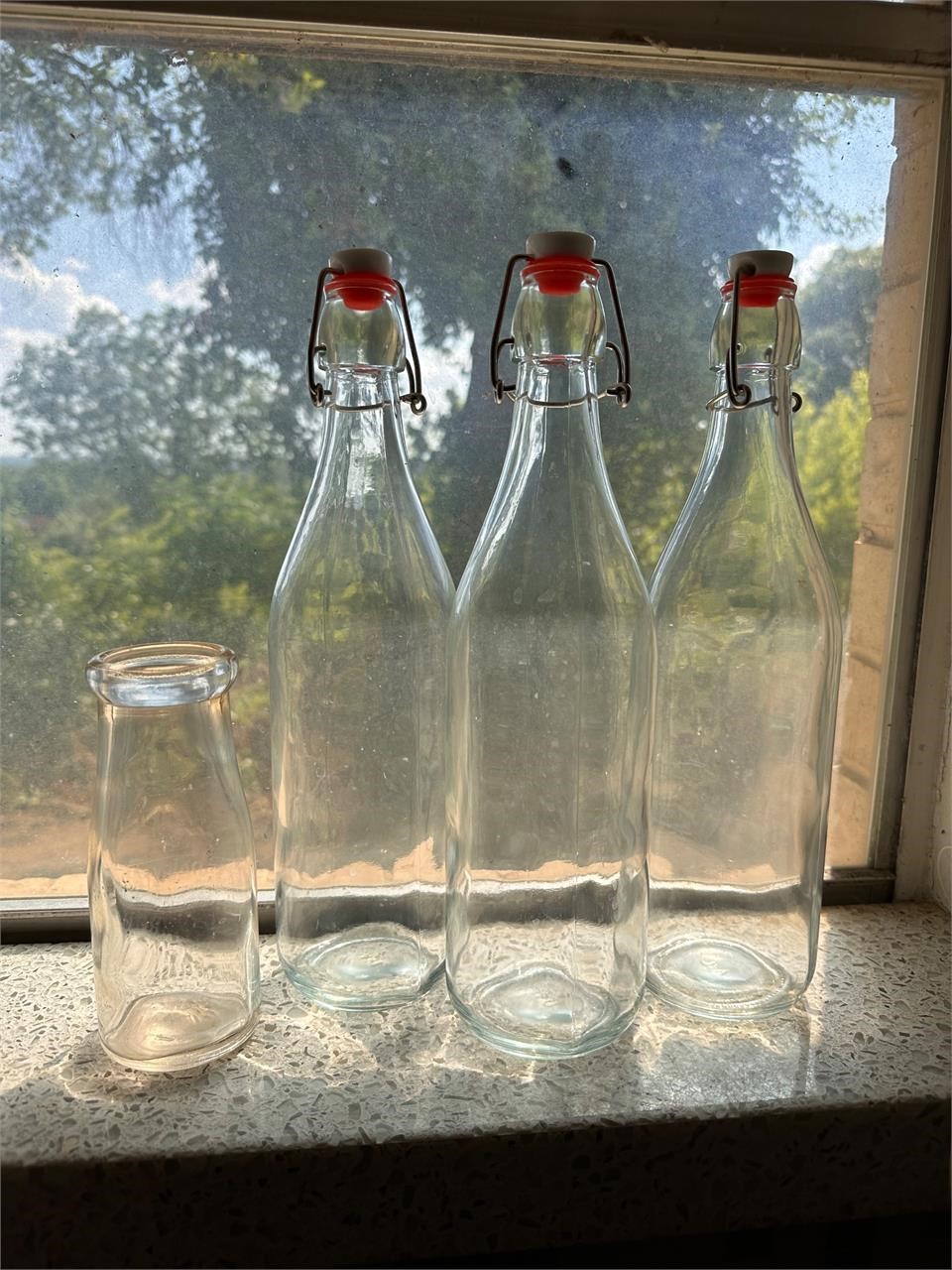 3 glass stopper bottles