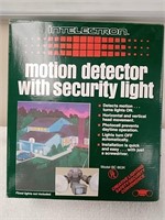 Motion detector with security light