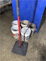 Quantity of concrete stamping powder and a hand