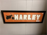 Framed Harley Davidson sign.