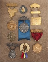 Collection of nine vintage Watch Fobs and Pins