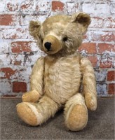 A Large Blonde Long Mohaired Teddy Bear, jointed