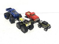 4 Larger Monster Truck Die Cast Toys