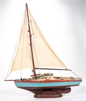 FOLK ART CARVED AND PAINTED POND SAILBOAT, large