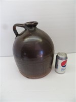 Brown stoneware beehive jug (small chip on lip)