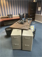 A desk 2 metal file cabinet one garbage can 2