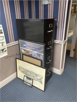 Four drawer, metal file cabinet in for framed