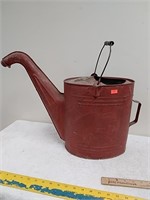 Painted galvanized watering can