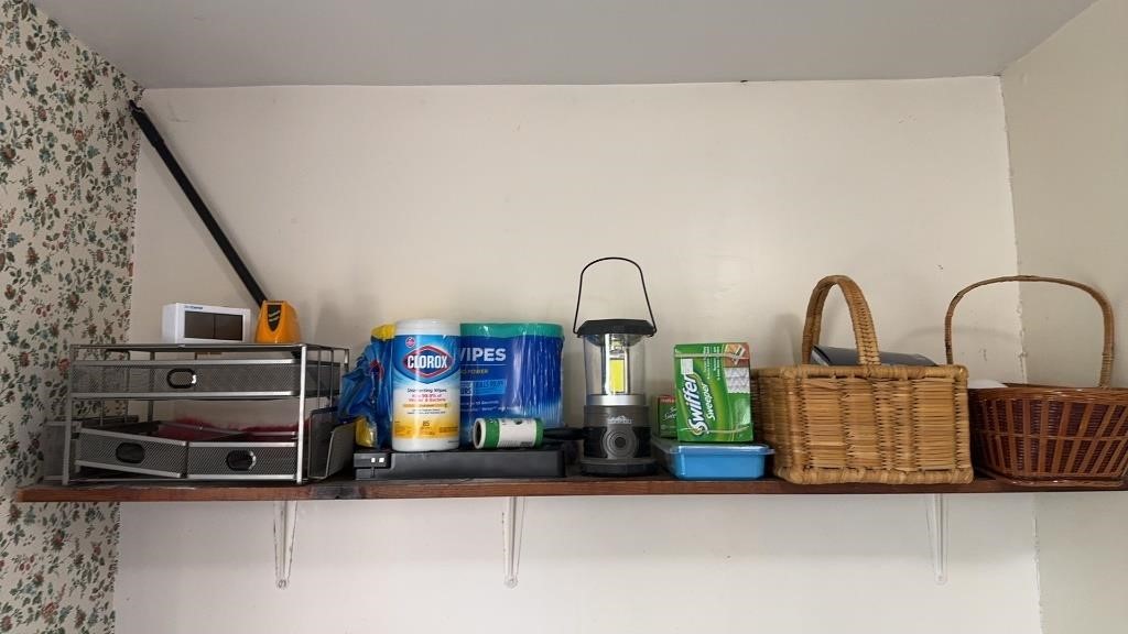 Shelf lot with some cleaning supplies