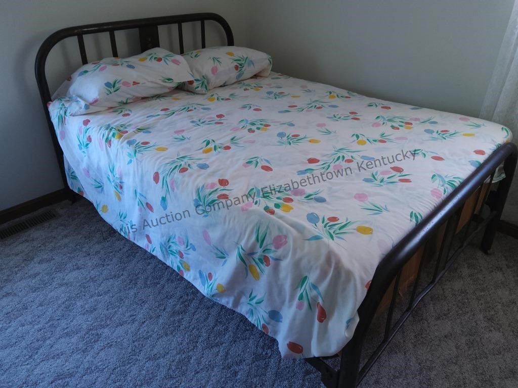 Iron bed with Linens mattress and box springs are