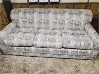 LIGHT BLUE PATTERNED COUCH 76"X39"X32"