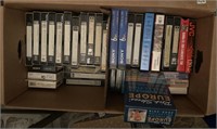 Large box of VHS tapes. Many on travel, exercise,
