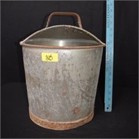 Antique galvanized milking can