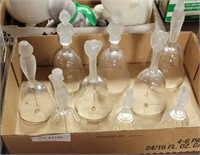 FLAT OF GLASS BELLS W/ FIGURE-SHAPED HANDLES