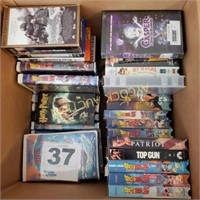 Box full of VHS movies -