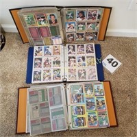 Several binders full of baseball trading cards