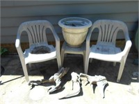Plastic Chairs, Table, Flower Pot, Drift Wood