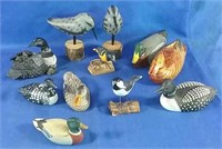 Lot of wood carved birds and ducks