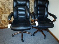 two executive roller chairs